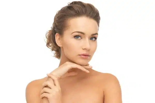 Portrait highlighting a clean profile and defined neck, representing the ideal result of Kybella treatment for submental fat reduction.